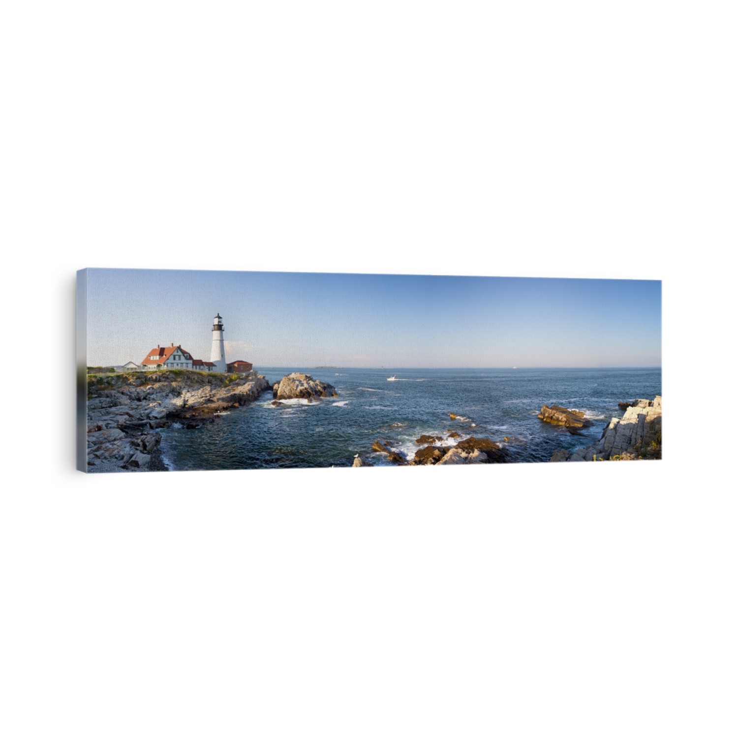 A panorama of the Portland Head lighthouse and rugged coastline, Maine, USA
